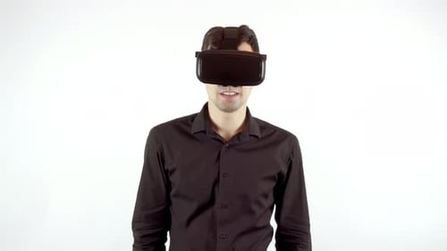 Excited Young Adult Using Virtual Reality Headset