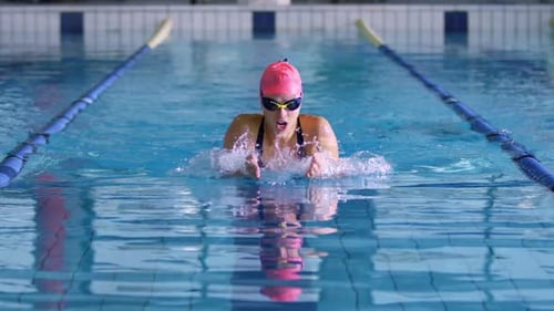 Swimmer training in a swimming pool