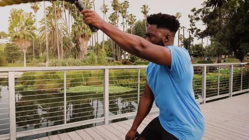 Athlete man working out in the park