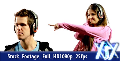 Young Adults Wearing Headphones Dancing to Music