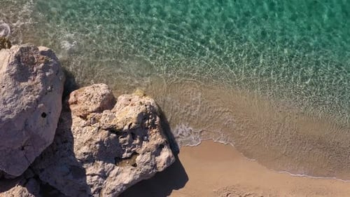 Top View of Rocky Coastline of Maldives Island with Clear Turquoise Water