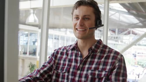 Young man working in a creative office