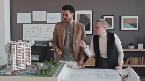 Two Architectural Designers in Office