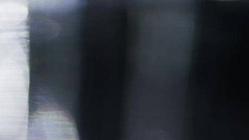 Abstract Light Leaks on a Black Background