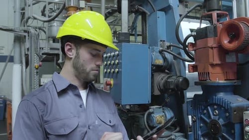 Engineer working in factory