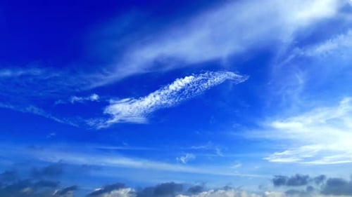 Dramatic Clouds Time-Lapse Over Vivid Blue Sky