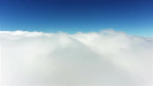 Aerial View of Fluffy White Clouds and Blue Sky