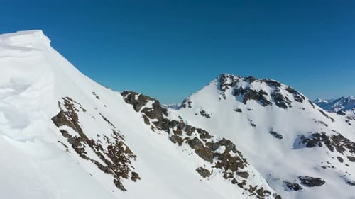 Flying Close to Snowdrifts in the Mountains
