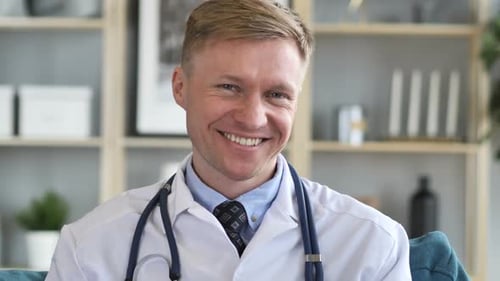 Yes Serious Confident Doctor Shaking Head to Agree
