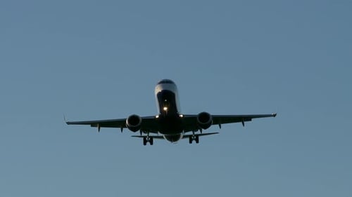 Modern Airplane Airliner Landing at Airport