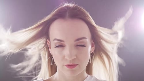 Blonde Woman Looking at Camera