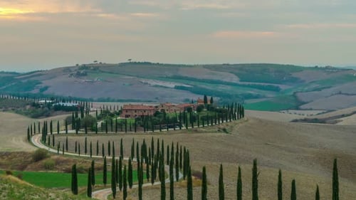Sunset time lapse of Tuscany landscape in Italy