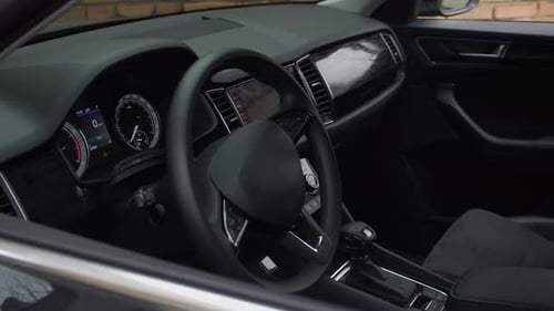 Car Interior Dashboard and Steering Wheel