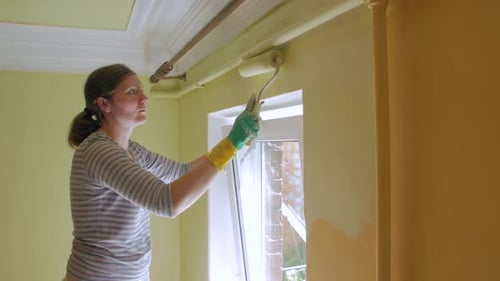 A Girl Paint The Walls