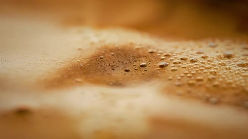 A Falling Drop in a Coffee Cup