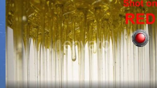 Close Up Honey Dripping Downwards