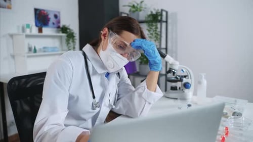 Tired Doctor at the End of Working Day