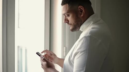 Pensive Phone User Satisfied with New Mobile App