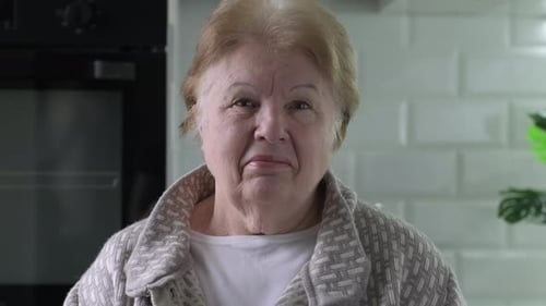 Senior Woman Looking at Camera Close Up