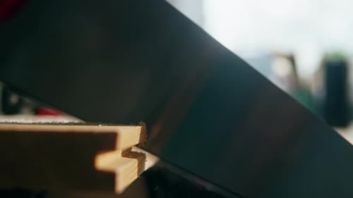 Sawing Wooden Board Closeup