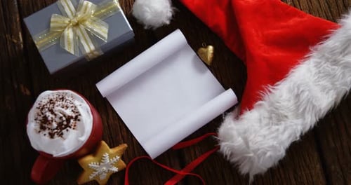 Blank Paper with Santa Hat and Gift Box on A Plank 4k