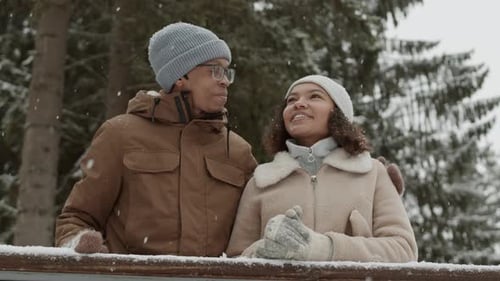 People Having Pleasant Talk in Winter Woods