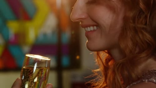 Beautiful woman drinking champagne