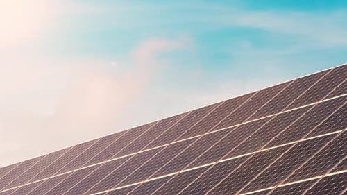 White Cloud Flows on the Solar Panels New Energy Concept