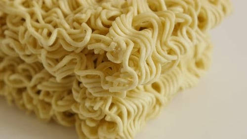 Dry Uncooked Instant Ramen Noodles Block Close Up