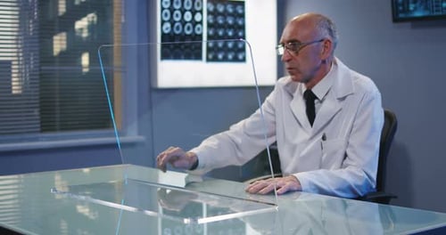 Doctor Using Transparent Display Screen
