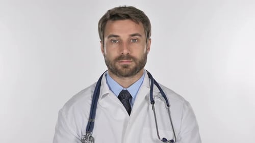 Doctor Looking at Camera in Studio on White Background