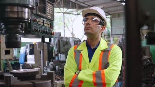 Smart Factory Worker Using Machine in Factory Workshop