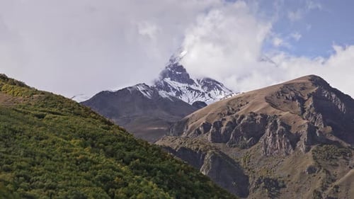 Timelapse of mountain covered in clouds