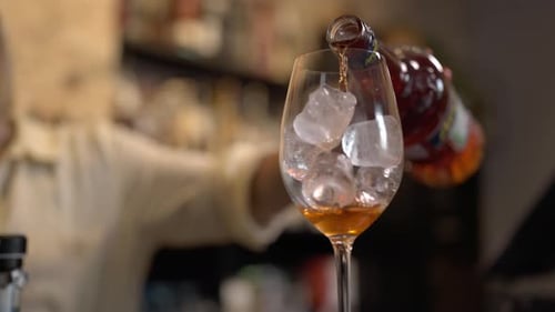 Preparing an Aperol Spritz Cocktail