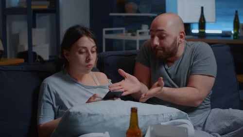 Angry Husband and Wife Renters Calculating Household Payments