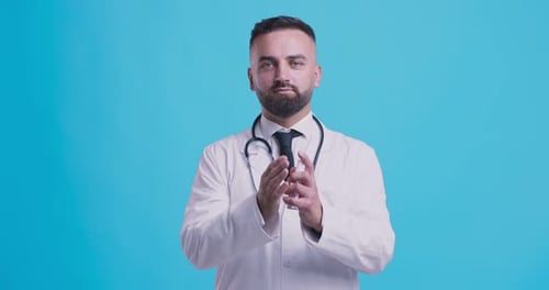 Doctor Demonstrating Hand Washing Technique for Hygiene