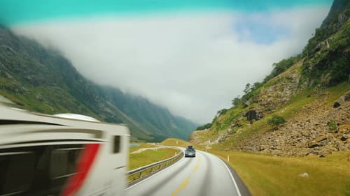 Car Travel in Norway Drive on a Scenic Road Among the Mountains