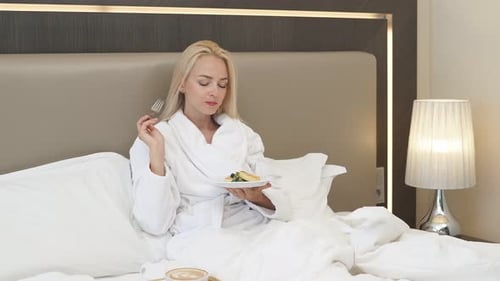 Attractive Lady Enjoy Breakfast in Hotel
