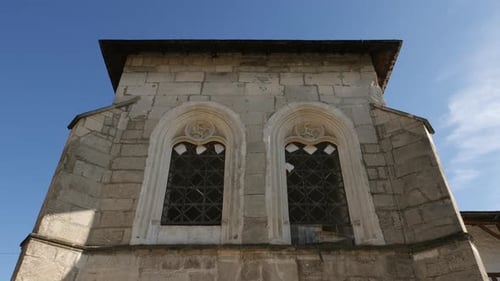 Low angle view of a building with two windows