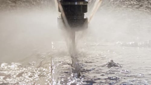 Slow motion of CNC mill manufacturing an advanced metal part