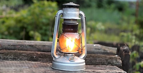 Standing Oil Lamp Is Lit