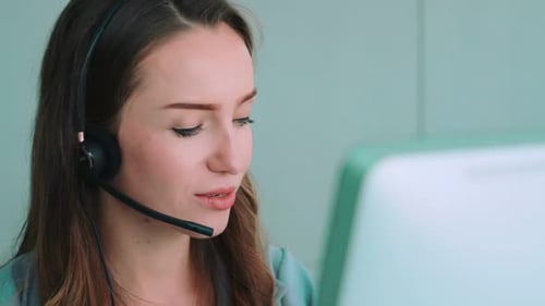 Business People Wearing Headset Working in Office
