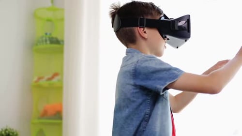 Boy Using Virtual Reality Headset in Bedroom