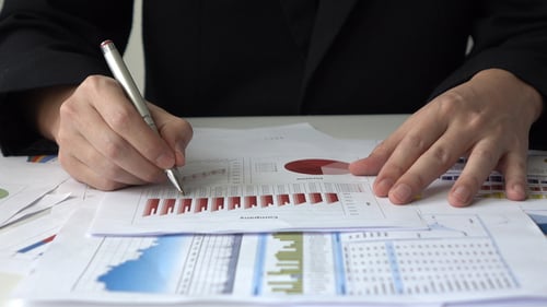 Financial Report Review in Urban Office Setting