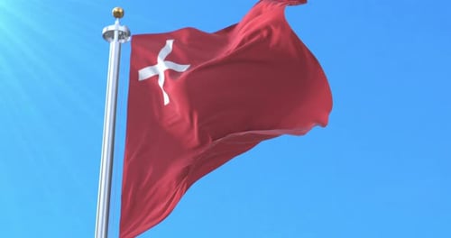 Realistic Waving Flag of Tonga in Bright Blue Sky