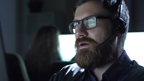 Cheerful Call Centre Operator Working