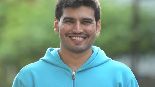 Young Happy Persian Man Outdoors