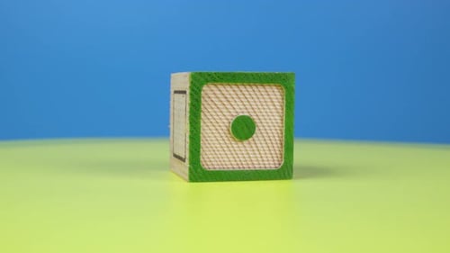 Close up shot letter "dot" alphabet wooden block