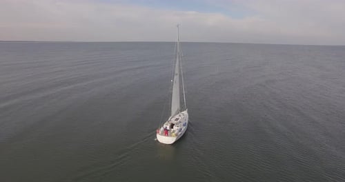 Sailboat Sailing on the Ocean From Aerial View