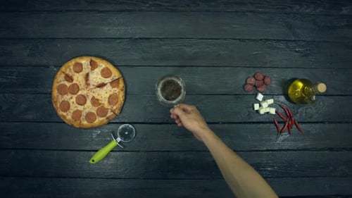 Beer and Pepperoni Pizza on Ecological Black Background
